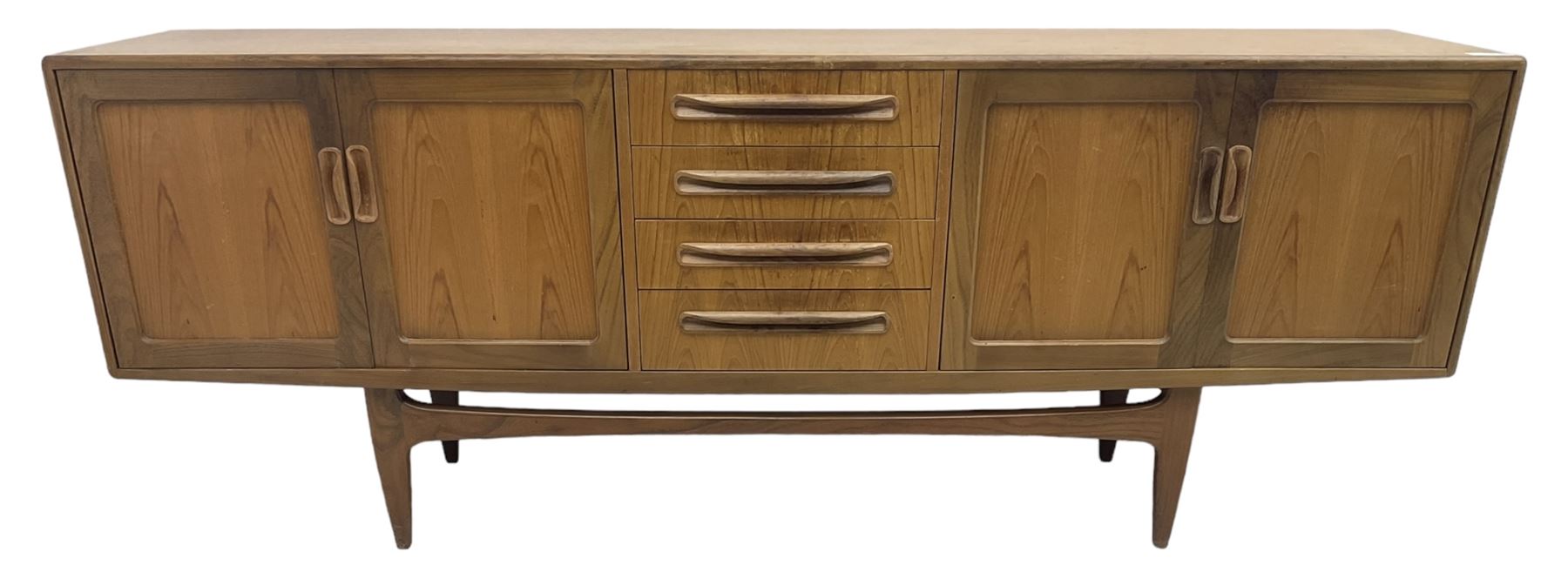 G-Plan – teak sideboard, four central drawers flanked by two double cupboards, enclosed by panelled doors 