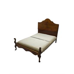 Early 20th century walnut 4' 6'' double bedstead with base, the shaped headboard with matched figured veneers, cabriole footboard