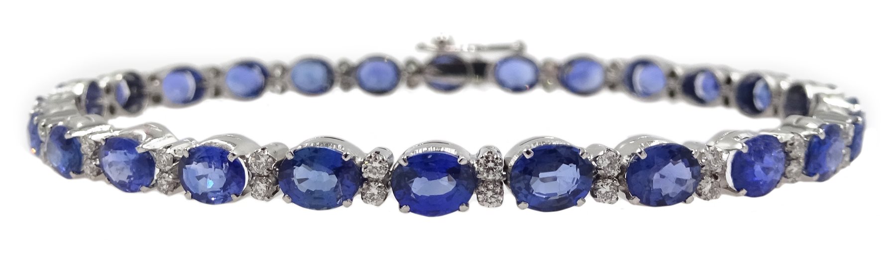 18ct white gold oval sapphire and diamond bracelet, stamped 750, total sapphire weight approx 12.00 carat