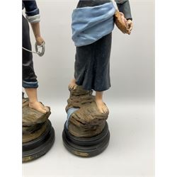A pair of spelter painted figures, modelled as cod fisher and shrimp fisher, both on wooden bases, H68cm.