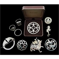 Collection of Scottish silver jewellery including two Ola M Gorie Maeshowe Dragon and St Magus Cathedral brooches, two rings by the same hand, two Geoffrey G Bellamy for Ivan Tarratt Pisces and seahorse brooch, three other brooches and a ring, all hallmarked
