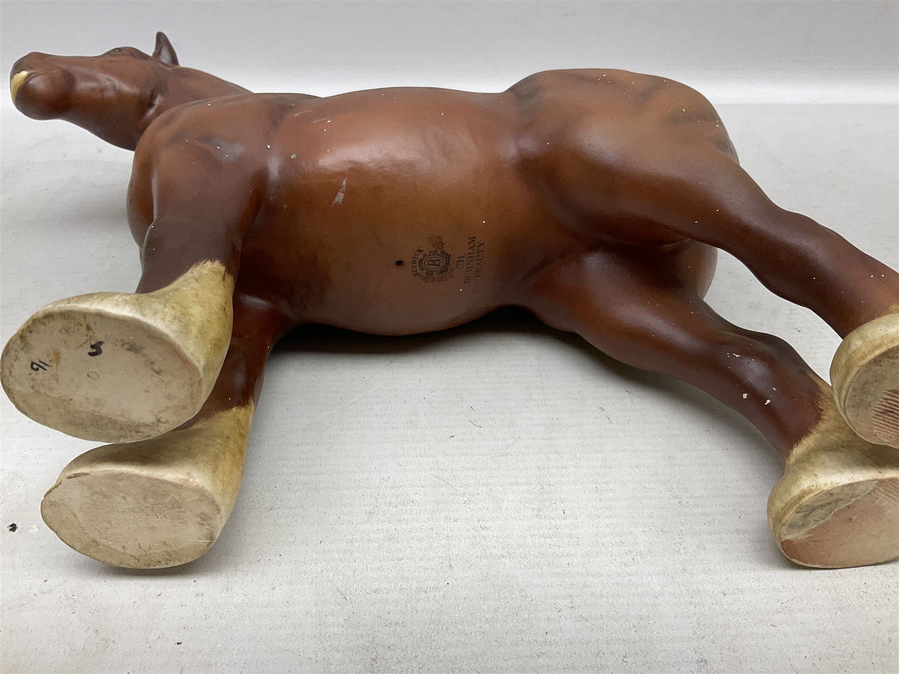 Group of three Beswick Shire horses, comprising CH. Burnham Beauty mare in matte finish, dapple grey horse and bay horse, all with stamped marks beneath