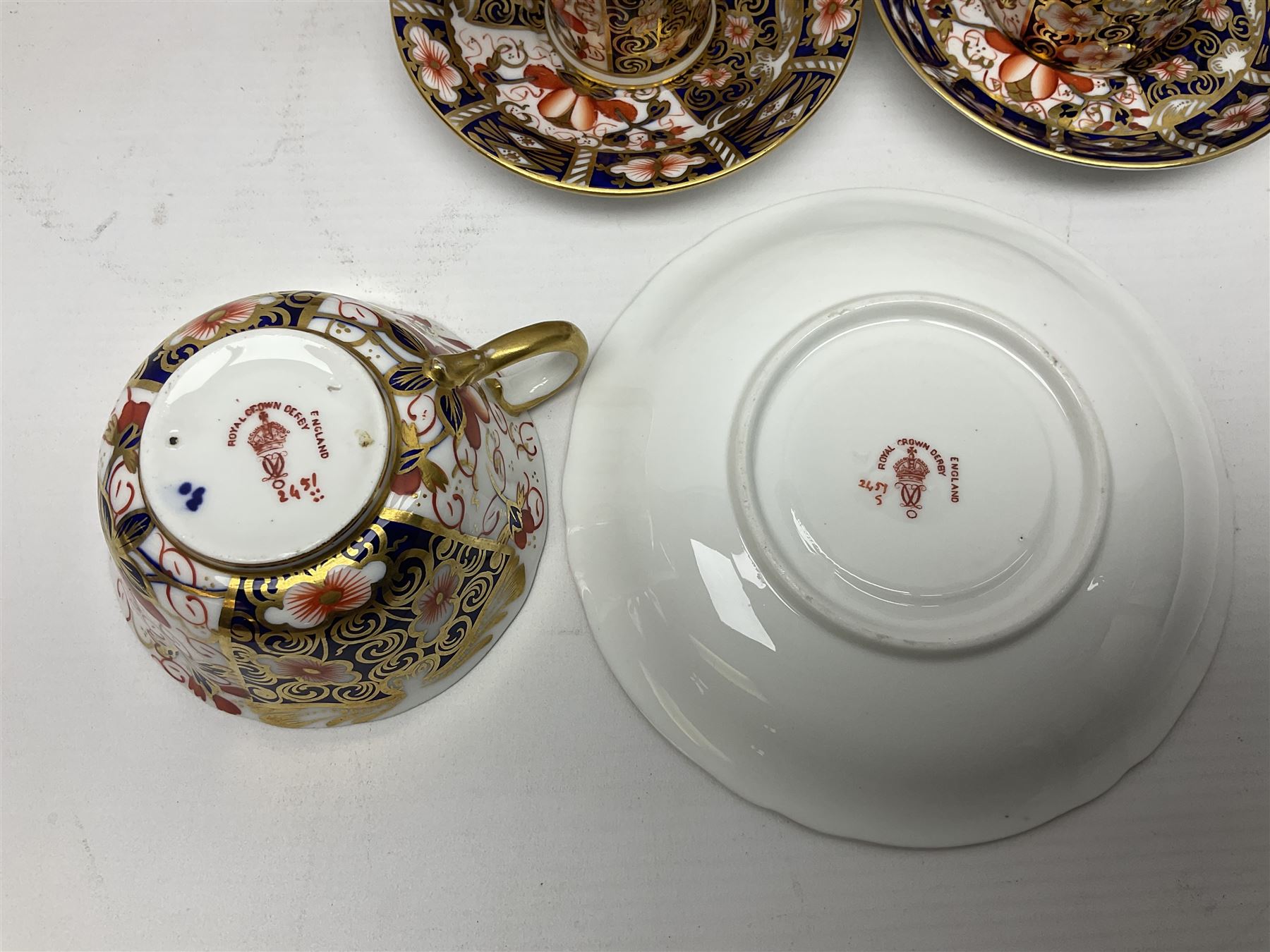 Six Royal Crown Derby cups and saucers all in imari pattern 2451, in various shapes  