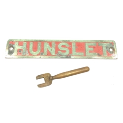 Channel tunnel - engine brass nameplate 'Hunslet', with traces of red paint  L43cm; and brass operating handle for an adhesion locomotive (2)