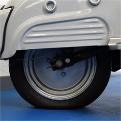1957 Zündapp Bella R154 Scooter

• Registration: 150 KPU
• Year: 1957
• Model: Bella R154
• Engine: 150cc two-stroke single-cylinder petrol
• Transmission: Four-speed manual
• Odometer reading: 1,727 miles
• Colour: Ivory
• Seating: Dual seat
• V5C: Present
• Original registration book: Present
• Keys: 1

A characterful 1957 Zündapp Bella R154 scooter, finished in ivory with a contrasting brown dual seat and displaying an odometer reading of 1,727 miles.

The Bella R154 formed part of Zündapp’s distinctive range of German touring scooters, combining a 150cc air-cooled two-stroke engine with four-speed transmission, large wheels and substantial pressed-steel bodywork. This example retains its enclosed front apron, central headlamp, chrome handlebars, brightwork, period VDO speedometer and decorative Bella badging.

An operation and maintenance manual is include and accompanied by its V5C and original registration book from 1957.

This vehicle forms part of the Estate of the Late John Sills and is offered for sale by the Executors, confirming a genuine reason for sale.
