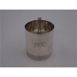 Mid 20th century silver christening mug, of plain cylindrical form, with reeded decoration to handle and base and monogrammed initials to body, hallmarked Atkin Brothers, Sheffield 1940