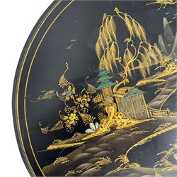 Early 20th century Chinoiserie lacquered circular occasional table, raised gilt decoration depicting traditional landscape scenes, on cabriole supports