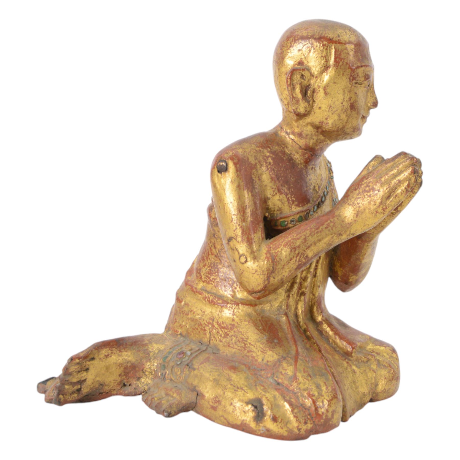 Late 19th century two Burmese Mandalay lacquered and gilt wood figures of monks, the robes edged with colored glass inlay and leafy scroll bands in raised lacquer, H25cm