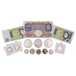 Three Queen Elizabeth II United Kingdom five pound coins, four two pound coins, two old round one pound coins, Queen Victoria 1887 shilling, Switzerland 1959 one franc, Bank of England Peppiatt one pound bank note 'H16H' and two Page one pound notes, both 'B14'