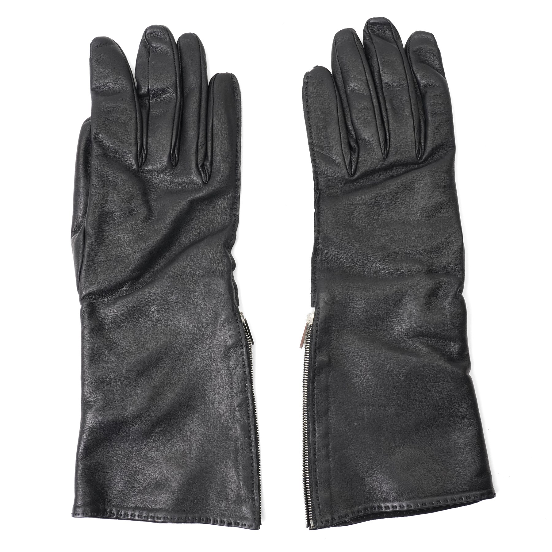 Hermès - pair of black leather long gloves, with H monogram zip fastening to the outer wrist and palladium-tone hardware, with original box