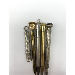 A late Victorian Sampson Mordan & Co silver push action propelling pencil, with foliate engraved decoration and suspension ring terminal, hallmarked Sampson Mordan & Co, London 1896, together with a group of vintage pens including examples by Eversharp, a number marked Silver Plated, Rolled Gold, and Gold Filled. 
