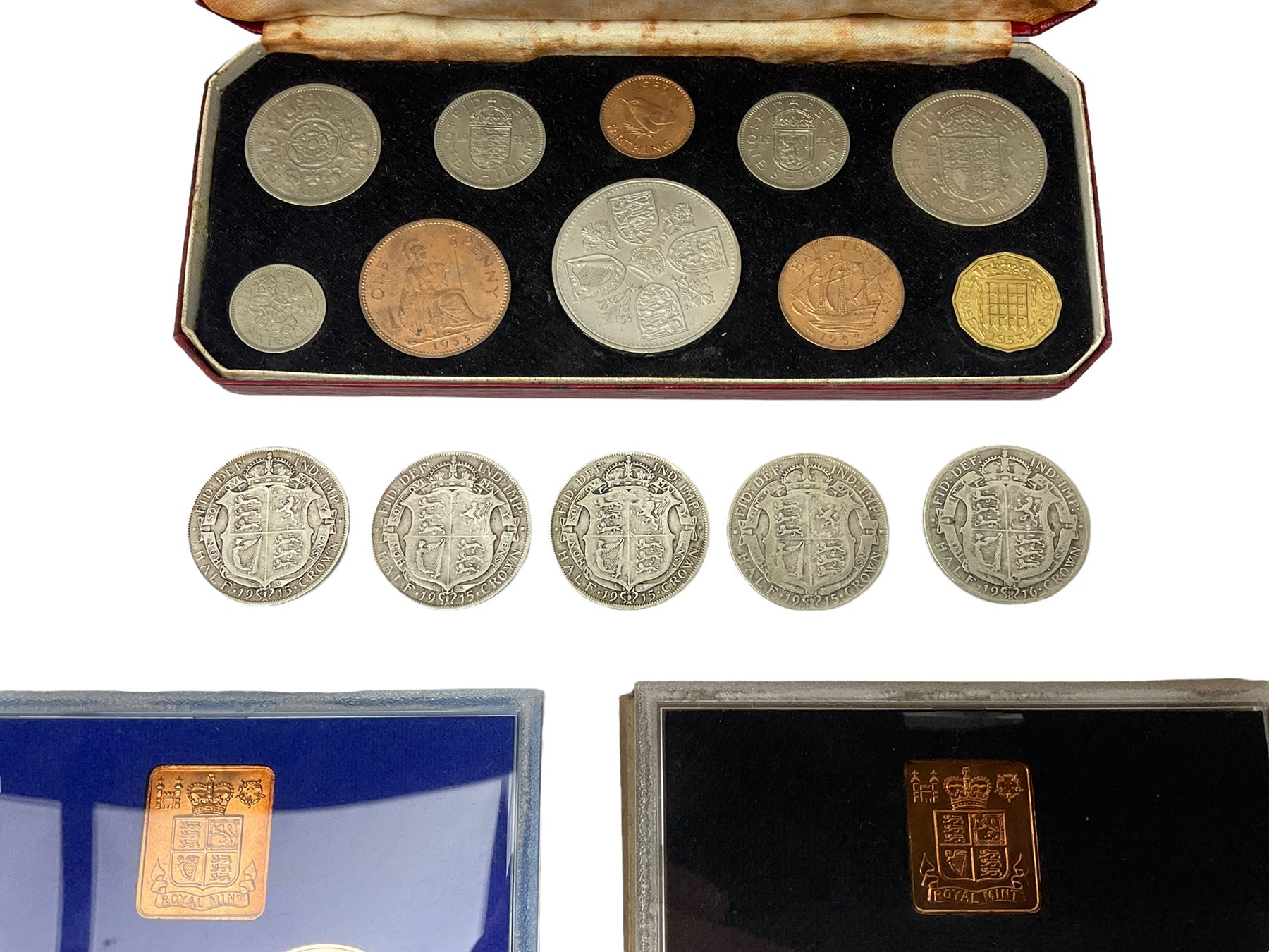 Four King George V 1915 and one 1916 silver halfcrown coins, Queen Elizabeth II cased 1953 ten coin set, 1977 silver proof crown and three Great British year sets dated 1977, 1978 and 1979