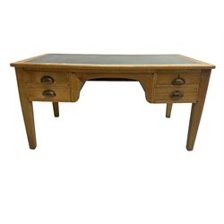 Early to mid-20th century light oak desk, rectangular top with inset writing surface, fitted with four graduating drawers, raised on square tapering supports 