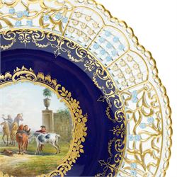 19th century Meissen cabinet plate, the reticulated border modelled with trellis panels and forget-me-nots,  the cobalt blue well with gilt bordered central reserve painted with a scene of a hunting party after Philips Wouwerman (Dutch 1619-1668), underglaze blue crossed swords and indistinct impressed numbers verso, D26cm