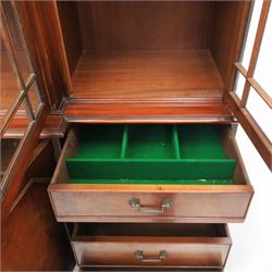 Wade Furniture - Georgian design mahogany breakfront bookcase cabinet, featuring four astragal glazed doors, above eight drawers and two cupboards, one fitted cutlery drawer