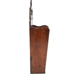 Three George III and later oak candle boxes, the first example of tapering form with shaped and pierced scroll crest, above a hinged lid, H50.5cm W18cm D13cm, the second of plain rectangular form with tapering crest, above a studded leather hinged sloped lid, H46cm W15.5cm D15.5cm, and third of plain rectangular form with demi-lune crest, with lift up front, H42.5cm W17.5cm D12cm 
