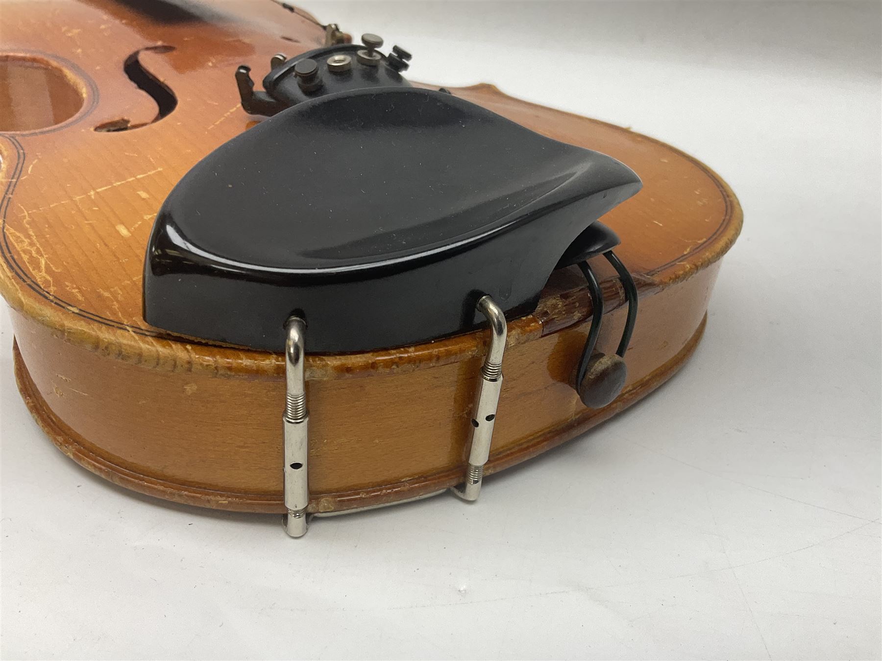 Four Chinese graduated violins - full size with 35.5cm two-piece back; three-quarter size with 33.5cm two-piece back; half size with 31cm two-piece back; and quarter size with 27.5cm two-piece back; all cased except full size; one with bow (4)