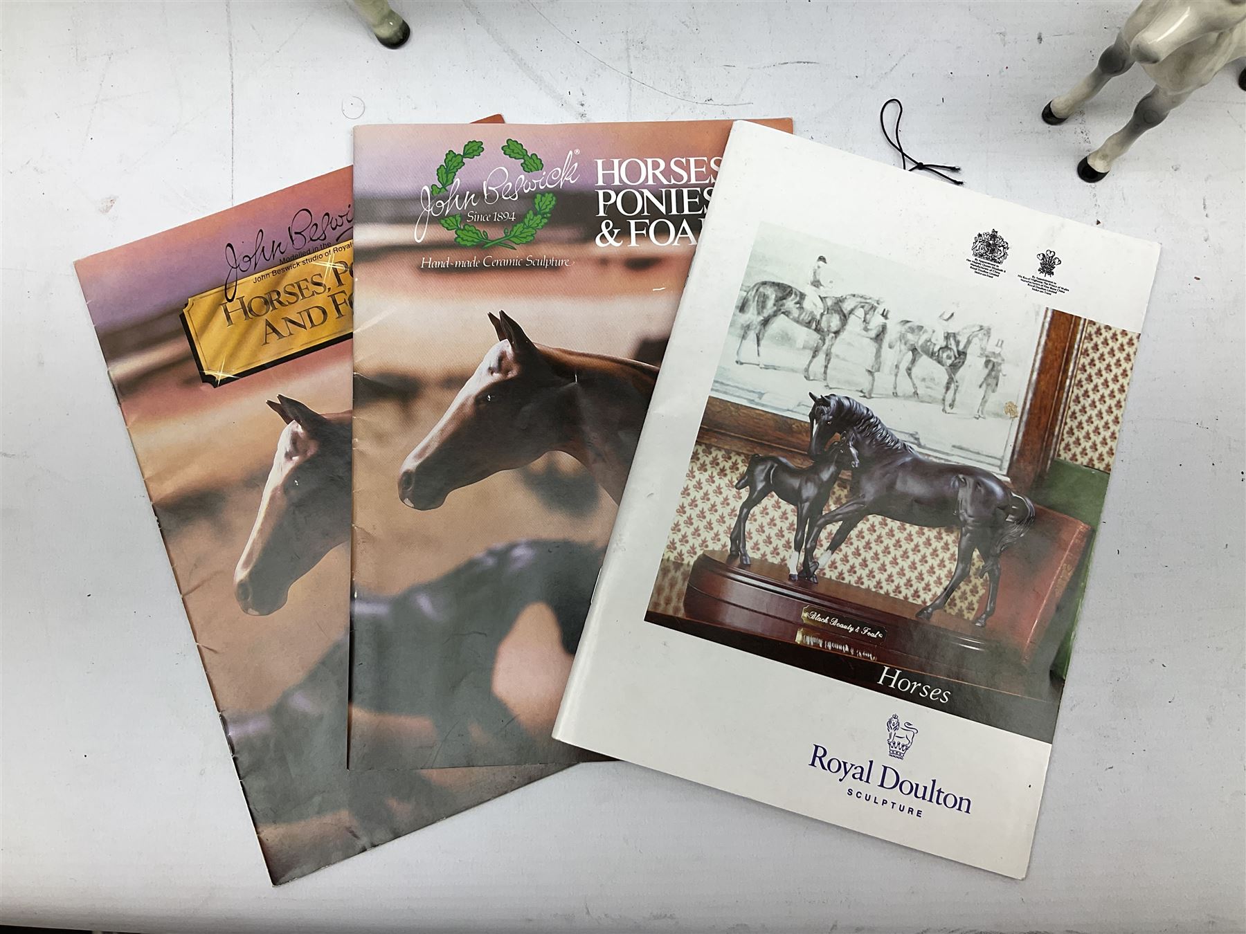 Seven Beswick figures of horses, including Connemara pony in grey no.1641, Arab in bay no.1265, large foal in grey no.947 etc, together with a Goebel figure of a horse (8)