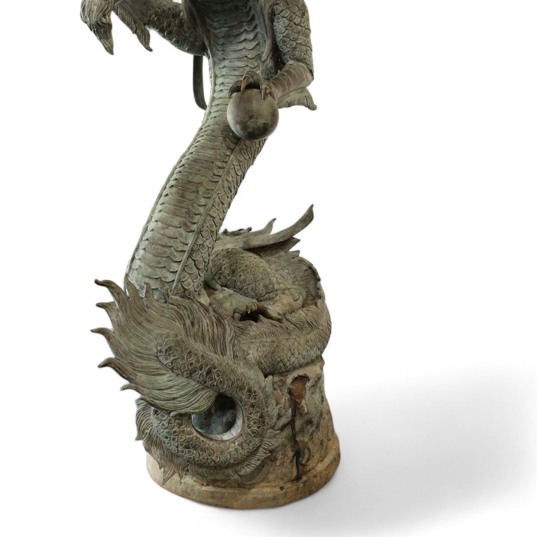 Verdigris hand finished cast brass Chinese Dragon garden centre-piece fountain, scaled dragon with gaping jaw holding an orb, curled tail on wave cast base