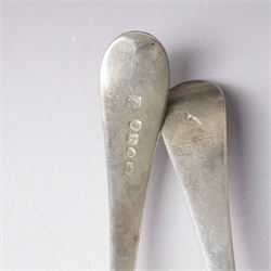 George III silver basting spoon London 1772, another engraved with initials London 1802 Thomas Wallis II, pair of table spoons London 1791 Maker Peter and Ann Bateman and two dessert spoons