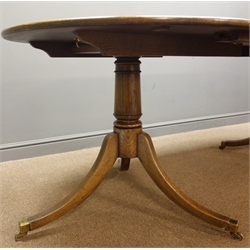  20th century medium oak twin pedestal extending dining table, turned columns on splayed supports, W107cm, H76cm, L222cm  