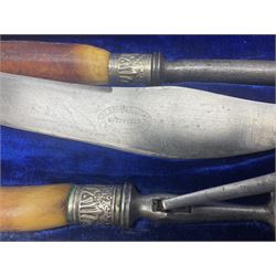 Sheffield silver-plated carving set, with carved antler handles, in blue velvet lined case, L43cm