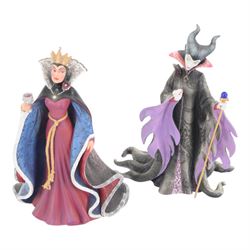 Disney Showcase Haute Couture figures, comprising Evil Queen, Cruella Devil and two Malificent, all boxed