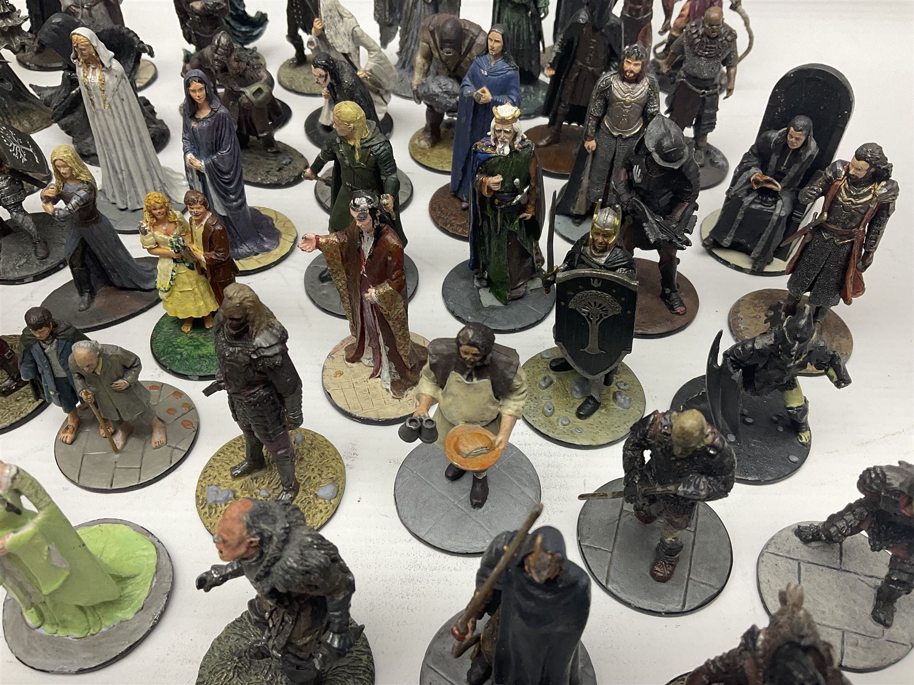 Approximately 80 NLP Lord of the Rings heavy metal painted figurines to include Fell Beast, boxed, and The Watcher, The Dark Lord Sauron, Treebeard etc, and unassociated Dracula themed composite figures marked HHFT50 