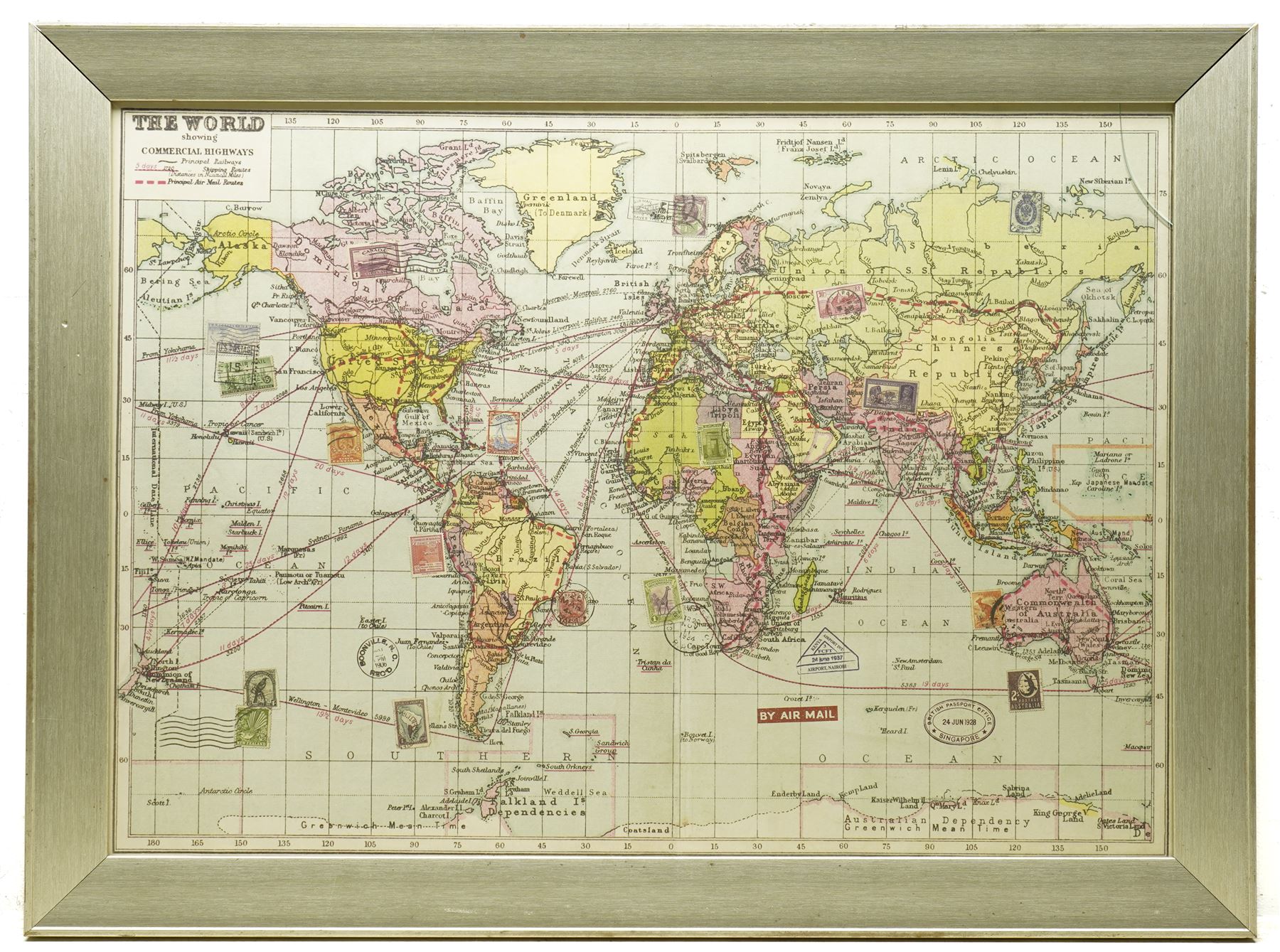 ‘The World Showing Commercial Highways’, mid-20th century colour-printed world map depicting principal railways, shipping and air-mail routes, embellished with printed postal and travel cachets including a British Passport Office, Singapore stamp (1928), Nairobi Airport (1937) and others 49cm x 69cm