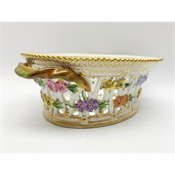 Royal Copenhagen Flora Danica basket, with naturalistically modelled vine handles and reticulated sides detailed with polychrome forget-me-nots, the interior decorated with a botanical study of 'Anagallis arvensis', sprigs and a gilt border, with printed and painted marks beneath, H8cm L26cm 

