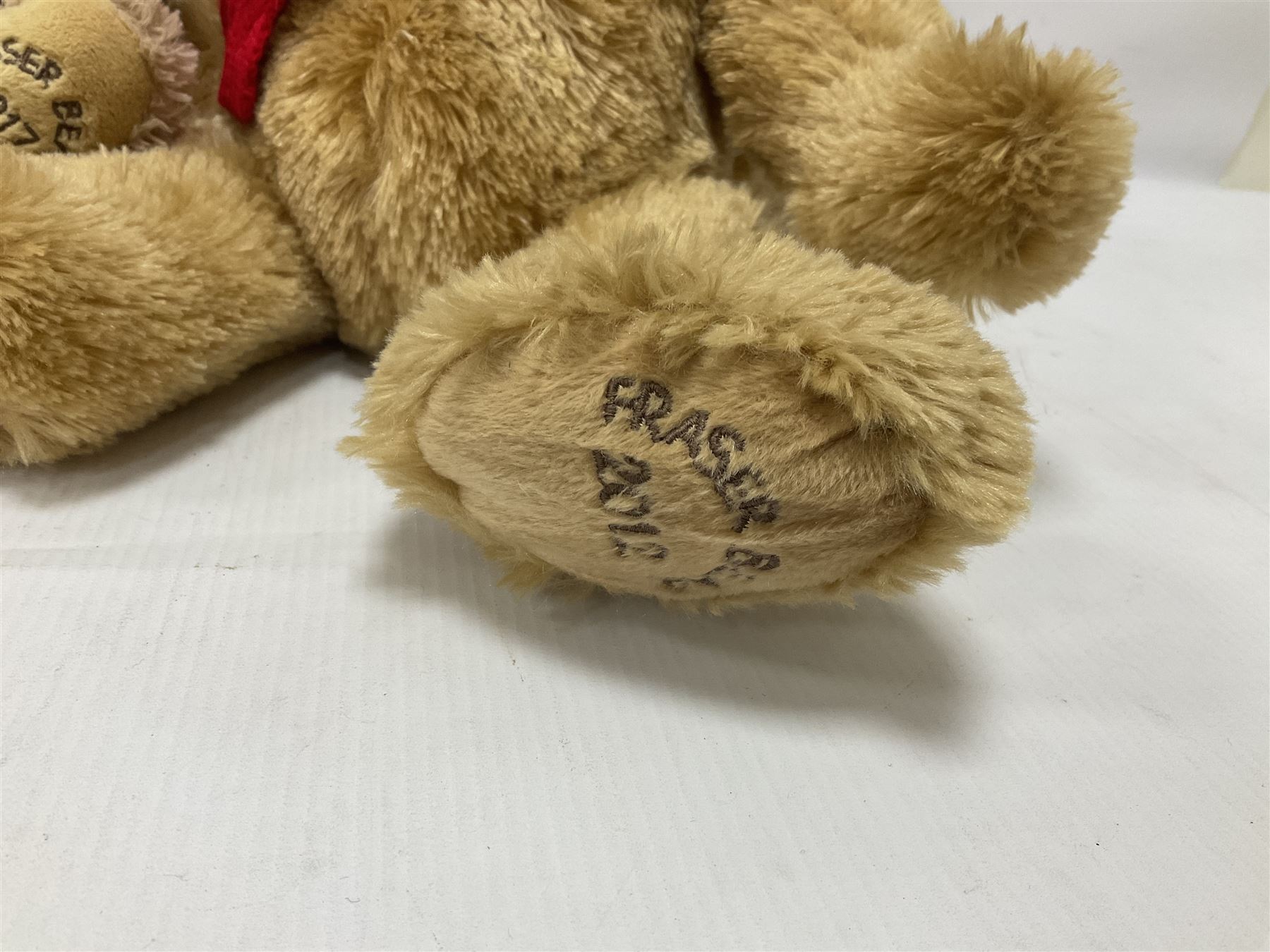 Eight annual Fraser Bears, by House of Fraser, dating between 2012 and 2019, tallest H35cm