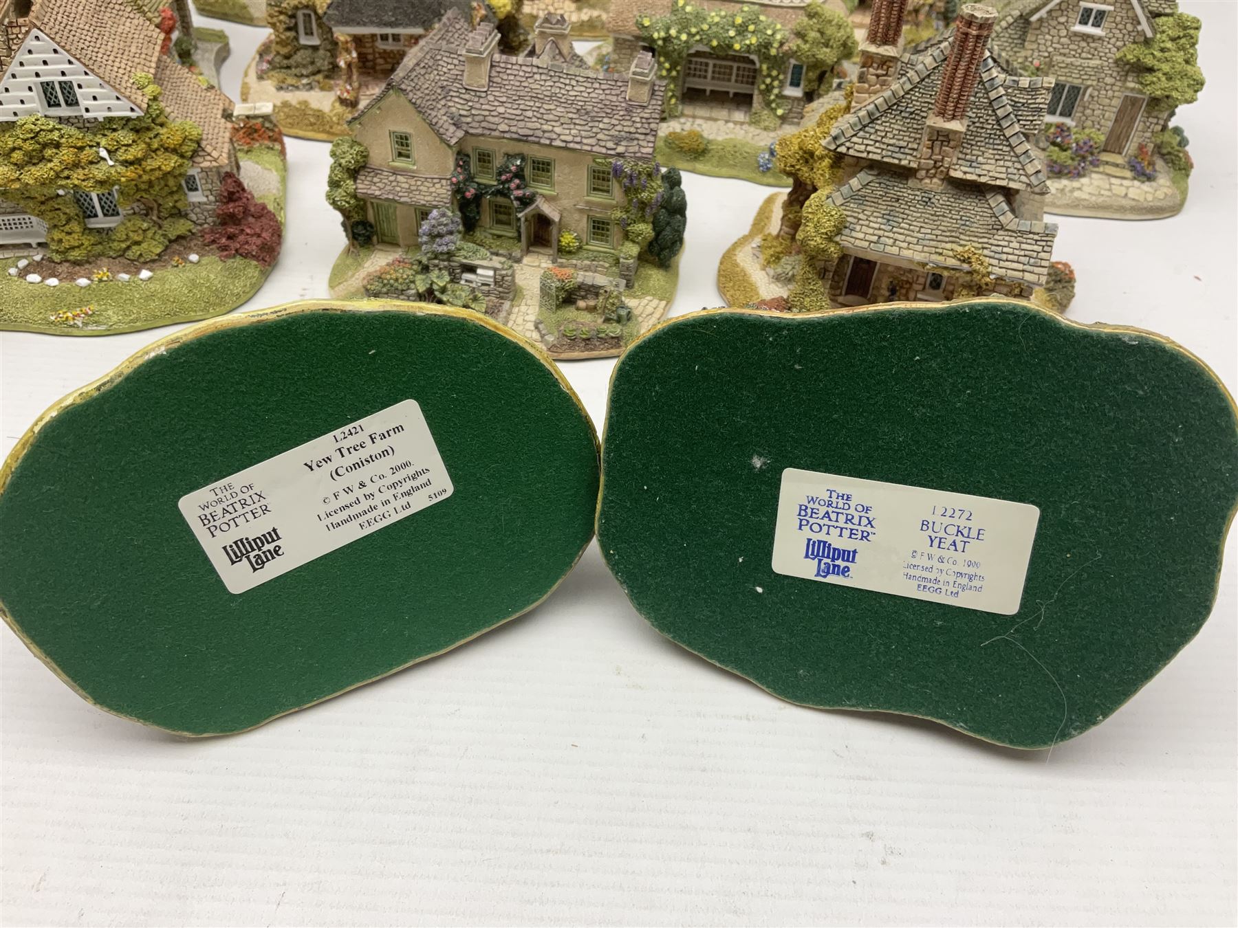 Eight Lilliput Lane limited edition Beatrix Potter models, including Buckle Yeat, Tabitha Twitchits Shop and Ginger Pickles Shop, together with twelve Lilliput Lane models from the Blaise Hamlet collection, including Dial Cottage, Diamond Cottage and Vine Cottage, all with deeds and original boxes (20)