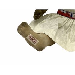 1920s Chad Valley 'Bambina' doll, the pressed felt head with applied hair, side glancing inset glass eyes, painted facial features and velvet jointed body, Hygenic and Bambina labels to the feet H46cm