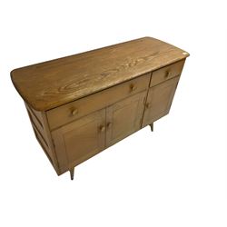 Lucian Ercolani for Ercol - Model 351 light elm and beech sideboard, fitted with three cupboards beneath one short and one long drawer