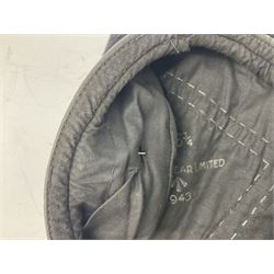 WW2 British black felt beret with Pioneer Corps cap badge, with Kangol Wear maker's mark dated 1943; and a British Army green webbing belt (2)