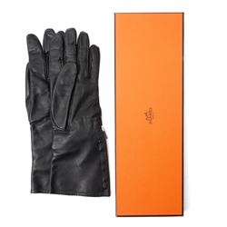 Hermès - pair of black leather long gloves, with H monogram zip fastening to the outer wrist and palladium-tone hardware, with original box