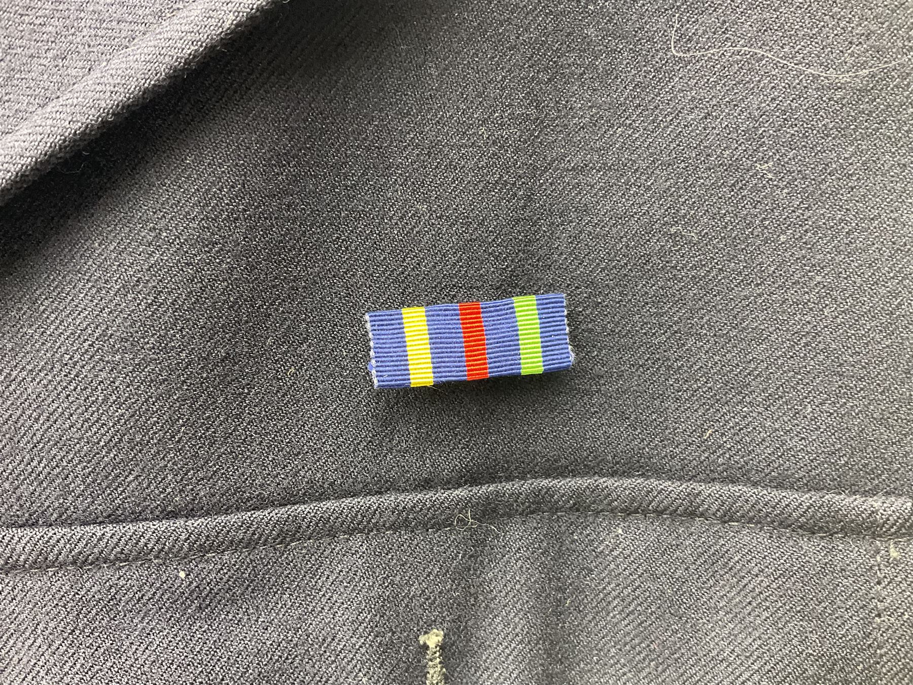 1950s British Red Cross North Yorkshire dress uniform comprising tunic, trousers, greatcoat and visor cap; bears manuscript label '1956 Ware'