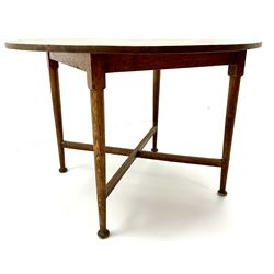 Early 20th century circular dining table, turned tapering supports joined by ‘X’ shaped base