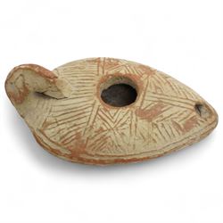A group of five ancient terracotta oil lamps - Near East and Eastern Mediterranean (c.3rd millennium BC-9th century AD) comprising: Levantine open bowl-type lamp (c.3rd-2nd millennium BC) hand-formed with pinched spout and rounded profile; Near Eastern pinched-spout lamp (c.1200 BC) of coarse red clay with wide central fill hole; Roman oil lamp (c.1st-2nd century AD) with flared spout and a rosette-stamped base; Roman circular oil lamp (c.2nd-3rd century AD) with deeply moulded floral decoration in high relief around the fill hole; and a larger Early Islamic (Arab) lamp (c.7th-9th century AD) decorated with incised geometric motifs to the upper surface
Provenance: By the vendor’s repute, acquired/collected in the Middle East (Dead Sea area/Syria) in the 1960s