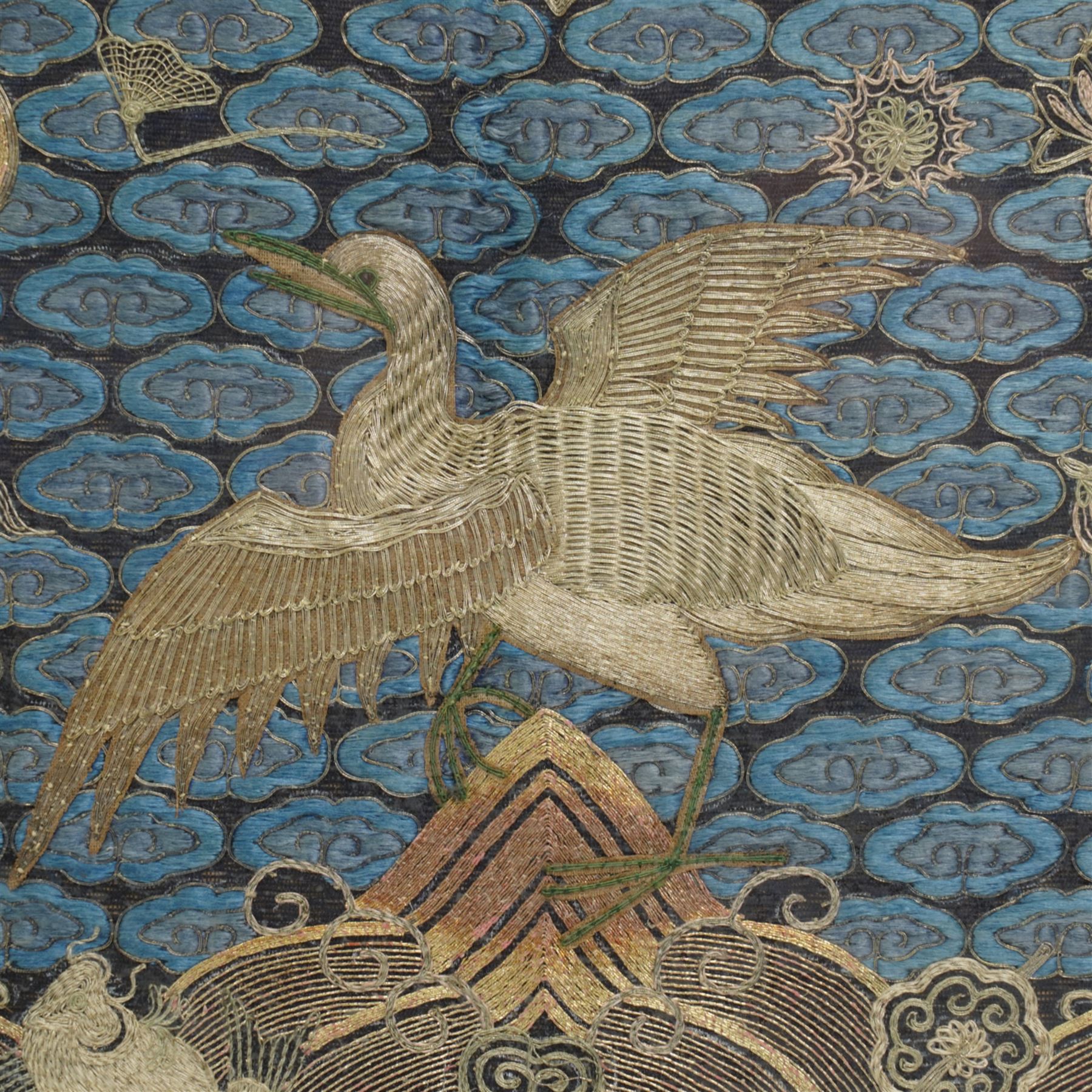 Early 20th century Chinese silk work tapestry, depicting a crane flying over a river, H30cm 