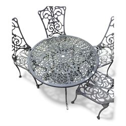 Cast aluminium garden table and four chairs in dark grey