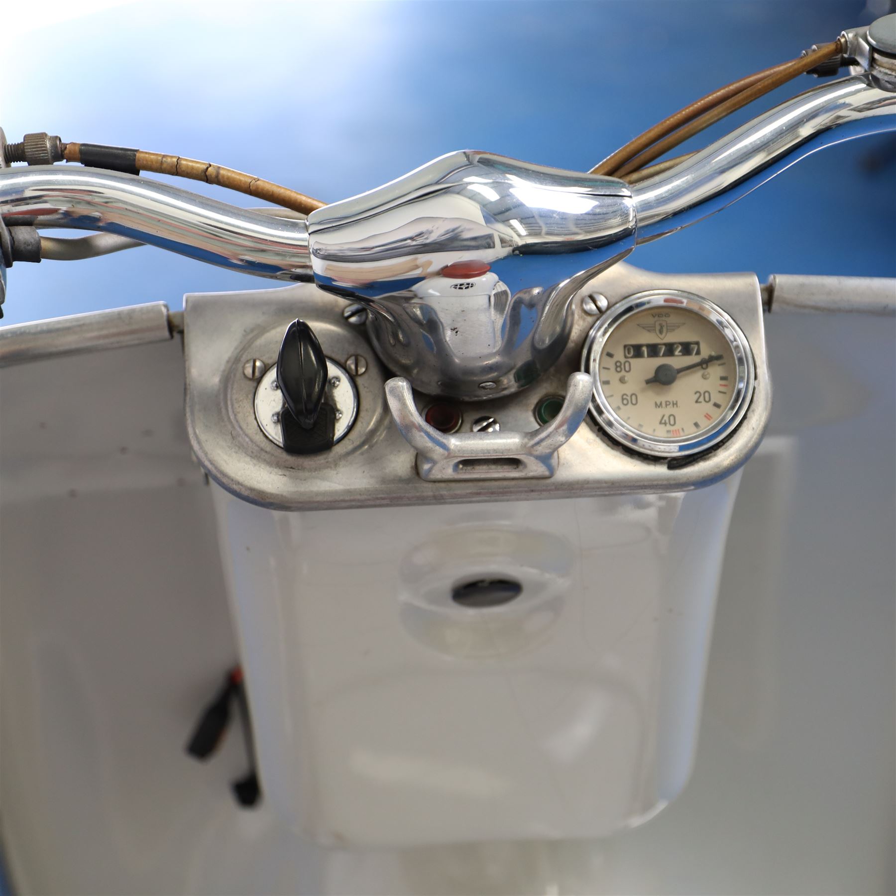 1957 Zündapp Bella R154 Scooter

• Registration: 150 KPU
• Year: 1957
• Model: Bella R154
• Engine: 150cc two-stroke single-cylinder petrol
• Transmission: Four-speed manual
• Odometer reading: 1,727 miles
• Colour: Ivory
• Seating: Dual seat
• V5C: Present
• Original registration book: Present
• Keys: 1

A characterful 1957 Zündapp Bella R154 scooter, finished in ivory with a contrasting brown dual seat and displaying an odometer reading of 1,727 miles.

The Bella R154 formed part of Zündapp’s distinctive range of German touring scooters, combining a 150cc air-cooled two-stroke engine with four-speed transmission, large wheels and substantial pressed-steel bodywork. This example retains its enclosed front apron, central headlamp, chrome handlebars, brightwork, period VDO speedometer and decorative Bella badging.

An operation and maintenance manual is include and accompanied by its V5C and original registration book from 1957.

This vehicle forms part of the Estate of the Late John Sills and is offered for sale by the Executors, confirming a genuine reason for sale.