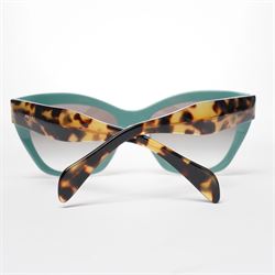Prada - pair of cat-eye sunglasses, with green acetate frames and graduated tinted lenses, the arms in tortoiseshell finish with gold-tone ‘Prada’ branding, unused with original hard case and box