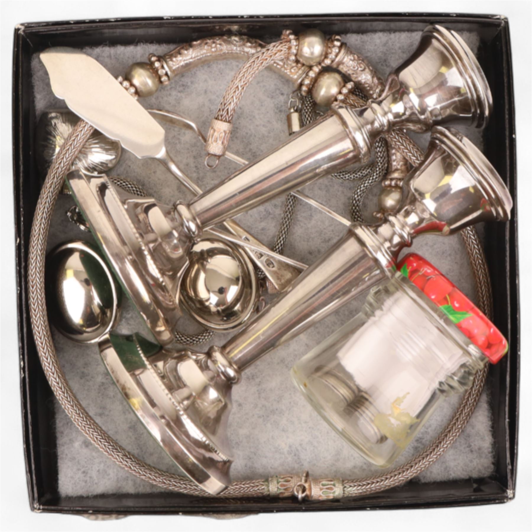 Pair of weighted silver candlesticks, silver tongs, silver knife, silver threepence coins, silver and costume jewellery