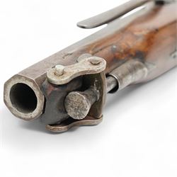 19th century percussion pistol with octagonal barrel, captive ramrod, belt hook, scroll engraved lock and trigger guard and walnut stock L25cm  