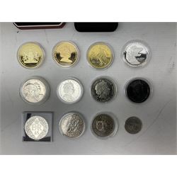 Coins including United States of America 1885 Morgan dollar, Queen Elizabeth II Bailiwick of Guernsey 20012 and 2013 five pound coins, Isle of Man Paddington Bear 2008 one crown, various other commemorative coins etc