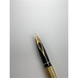Gold-plated lighter by S.T Dupont, gold-plated roller ball pen by Yard-O-Led, gold-plated fountain pen and roller ball pen by Sheaffer, silver pencil by Walker & Hall, Birmingham 1961 and one other American silver pencil by Wahl Eversharp, stamped Stirling