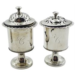1920's silver pepperette, of octagonal bellied form with pierced cover, hallmarked Reid & Sons, Chester 1927, H10cm, together with a pair of Victorian cruets, each of drum form with gadrooned rim, upon a pedestal circular spreading foot, hallmarked London, date letter and makers mark worn and indistinct, tallest example H8cm, and a Continental silver tumbler cup with personal inscription, foliate band beneath rim, and gilt interior, stamped beneath 900 875, H7.5cm, approximate total weight 7.51 ozt (233.8 grams)