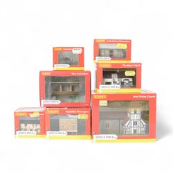 Thirty Hornby N gauge Lyddle End model railway trackside buildings, including N8031 Holy Trinity Church, N8575 Coal Drop, N8033 Radcliffe's Newsagent and N8002 Small Waiting Room, all boxed