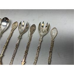 Set of four Continental silver spoons and forks, with stylised terminals, a number stamped S800, approximate weight 88.4 grams
